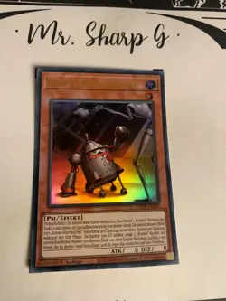 KOZMO-BLECHBUCHSE - 1. AUFLAGE GFTP-DE085 DEUTSCH Yu-Gi-Oh! CARD ULTRA RARE HOLO - Image 4