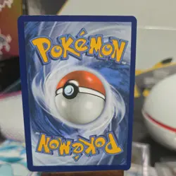 Team Rocket’s Tyranitar 096/182 Holo Card Destined Rivals - Image 2