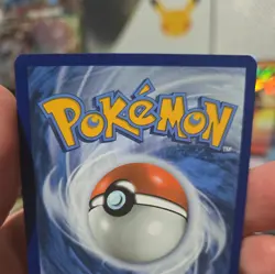 Team Rocket’s Tyranitar 096/182 Holo Card Destined Rivals - Image 3
