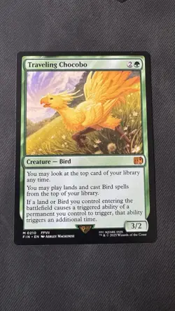 Traveling Chocobo - Universes Beyond: Final Fantasy FIN #0210 - Regular MTG Card - Image 1