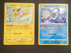 VAPOREON - 030/185 -JOLTEON - 047/185 - COSMOS HOLO - PROMO - POKEMON CARD - Image 1