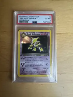 1/82 Dark Alakazam 1st Edition PSA 8 Holo Team Rocket Base Pokemon Card WOTC - Image 1