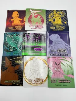 Pokemon ETB Players Guide Book Lot Of 9 - Image 1