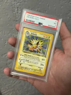 1999 Pokemon Jungle Jolteon Holo PSA 7 NM - Vintage WOTC Holographic Card - Image 1