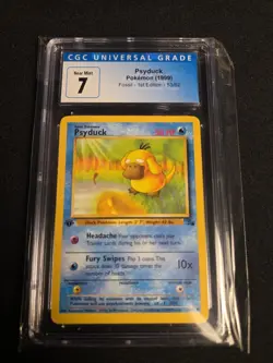 1999 Pokemon Fossil 1st Edition 53/62 Psyduck CGC 7 Near Mint - Image 1