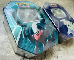 New Sealed Pokemon Tyranitar & Darkrai Triple Whammy Tin Booster Packs - Image 2