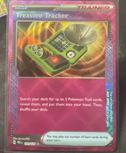 Pokemon Treasure Tracker 131/131 Prismatic Evolutions ACE SPEC Holo Rare NM - Image 1