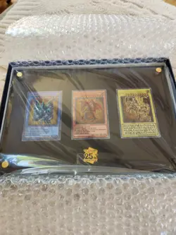 YuGiOh TCG 25th Anniversary Stainless Steel Egyptian God Cards - Image 1