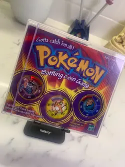 1999 Vintage Hasbro Pokemon Battling Coin Game (Vaporeon x Raichu x Omanyte) - Image 1