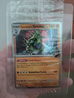 Team Rocket's Tyranitar 096/182 Sealed | Destined Rivals | Pokemon Center Stamp - Image 1