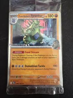 Team Rocket's Tyranitar 096/182 Sealed | Destined Rivals | Pokemon Center Stamp - Image 1