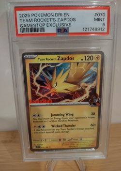 2025 POKEMON DESTINED RIVALS GAMESTOP EXCLUSIVE #070 TEAM ROCKET'S ZAPDOS PSA 9 - Image 1