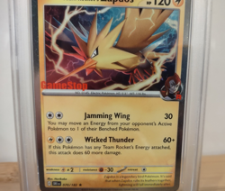 2025 POKEMON DESTINED RIVALS GAMESTOP EXCLUSIVE #070 TEAM ROCKET'S ZAPDOS PSA 9 - Image 3