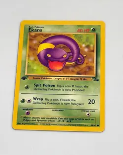 1st Edition Ekans 1999 Fossil Pokemon Card WOTC 46/62 - Image 1