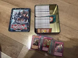 Over 400 Random Yu-gi-oh cards nearly packed into an old Yugioh collection tin. - Image 1
