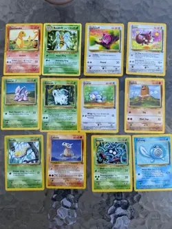 pokemon base set, jungle, fossil bulk charmander, Tangela over 50 card - Image 1