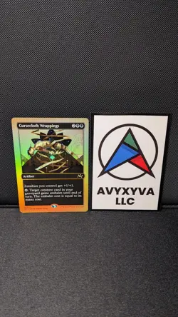 1 x Cursecloth Wrappings Foil Gold DFT NM MTG - Image 1