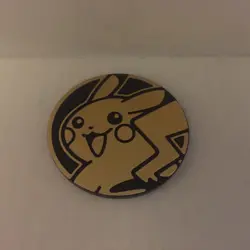 Pokemon Pikachu Black/Gold Plastic Flip Gaming 1.25" Coin - Image 1