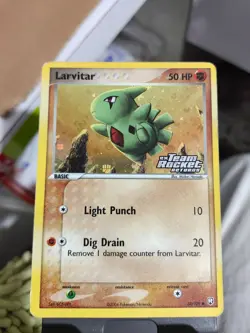 Vintage 2004 Larvitar 63/109 EX Team Rocket Returns Holo Rare Pokemon TCG Card - Image 1