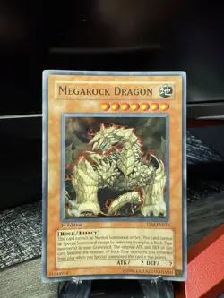 Megarock Dragon TLM-EN015 - 1st Edition YuGiOh Card - Image 1