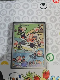 Clobbopus 207/191 Surging Sparks Illustration Rare Holo Pokemon NM - Image 1
