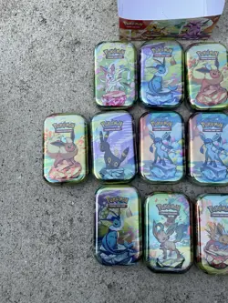 Pokemon TCG Prismatic Evolutions 11 Sealed Mini Tins Display Set Brand New - Image 2