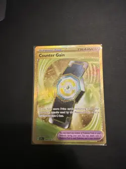 Counter Gain 249/191 Pokemon Surging Sparks Hyper Rare Gold NM - Image 1