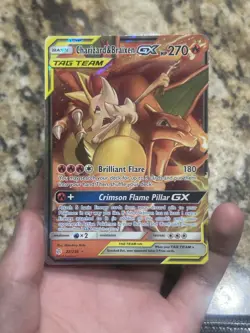Charizard And Braixen Tag Team Cosmic Eclipse Pokemon Card - Image 1