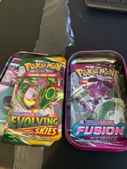 TWO PACKS POKEMON CARDS UNOPENED EVOLVING SKIES & FUSION STRIKE SEALED WITH TIN - Image 1