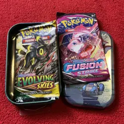 TWO PACKS POKEMON CARDS UNOPENED EVOLVING SKIES & FUSION STRIKE SEALED WITH TIN - Image 1