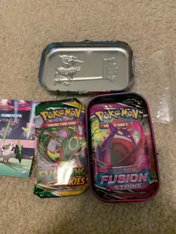 TWO PACKS POKEMON CARDS UNOPENED EVOLVING SKIES & FUSION STRIKE SEALED WITH TIN - Image 1