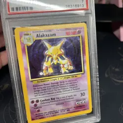 VINTAGE Pokemon TCG 1999 Pokemon Base Set Alakazam Holo #1 PSA 7 NM - Image 2