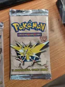 Pokemon Fossil Unlimited Booster Pack Zapdos Factory Sealed - Image 1