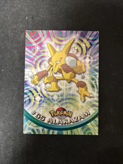 #65 Alakazam - Pokemon Topps Card - Black Logo - Image 1