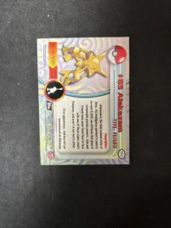#65 Alakazam - Pokemon Topps Card - Black Logo - Image 2