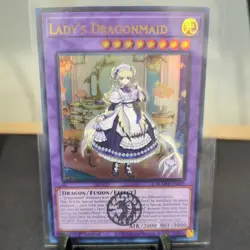 Yugioh Lady's Dragonmaid (Emblem) BLMM-EN049 Ultra Rare 1st Ed Near Mint - Image 1