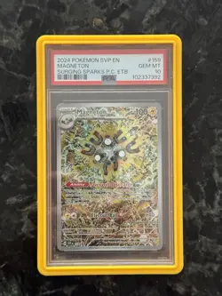 SURGING SPARKS POKEMON CENTER ETB PROMO MAGNETON PSA 10 scratch on slab - Image 1