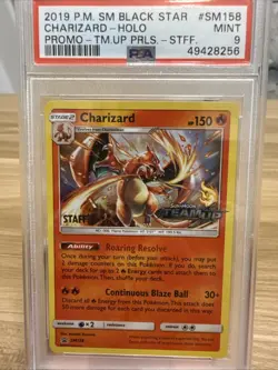 2019 PSA 9 Pokemon Staff Team Up Prerelease Charizard Black Star SM158 Card Mint - Image 1