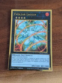 Yugioh Evolzar Laggia MGED-EN028 Premium Gold Holo Rare 1st Edition NM-M - Image 1