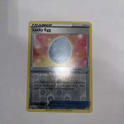 Lucky Egg 167/202 Reverse Holo Sword and Shield Pokemon Card TCG A21 - Image 1