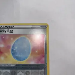 Lucky Egg 167/202 Reverse Holo Sword and Shield Pokemon Card TCG A21 - Image 3
