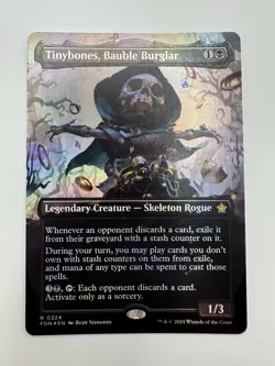 MTG TCG Tinybones, Bauble Burglar (Borderless) Foundations Foil - Image 1
