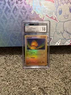 CGC 10 GEM MINT Trapinch 82/100 Reverse Holo EX Sandstorm Pokemon Card - Image 1