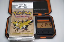 21.44g Pokemon WOTC Fossil Unlimited Booster Pack Vintage Sealed TCG Zapdos - Image 1