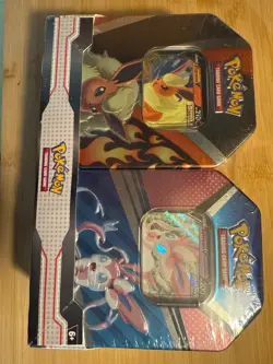 Pokemon Trading Card Game: Flareon Syleveon Tin Bundle 820650855641 - Image 1