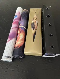4 Pokemon Playmats (New 151, Charizard UPC, Arceus & 1 Used Charizard UPC Mat) - Image 1