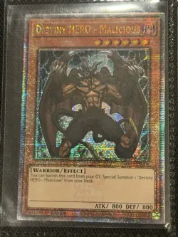 Yugioh Destiny HERO - Malicious (Quarter Century Secret Rare) RA03-EN001 - Image 1