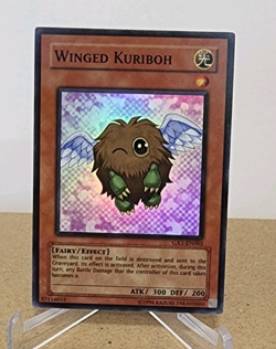 YuGiOh! Winged Kuriboh GX1-EN002 Unlimited Super Rare (LP-P) - Image 1