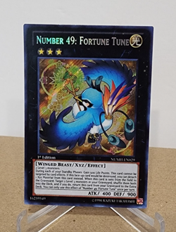 Yugioh! Number 49: Fortune Tune NUMH-EN029 Secret Rare 1st ED (LP-P) - Image 1