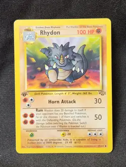 Pokemon - Rhydon 45/64 - 1st Edition Jungle - Image 1